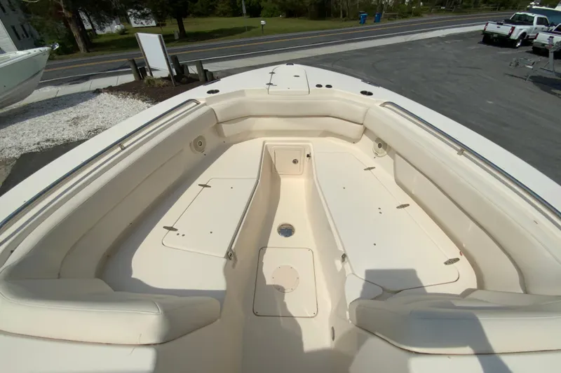 Slide: The Image of 2017 Grady-White Freedom 307 boat interior with spacious seating and storage compartments. - 27