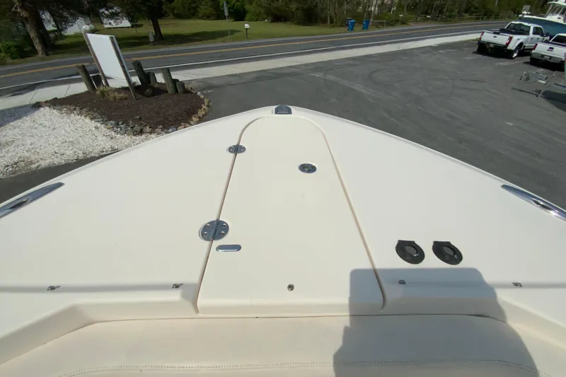 Slide: The Image of Bow view of 2017 Grady-White Freedom 307 boat in a parking area. - 28