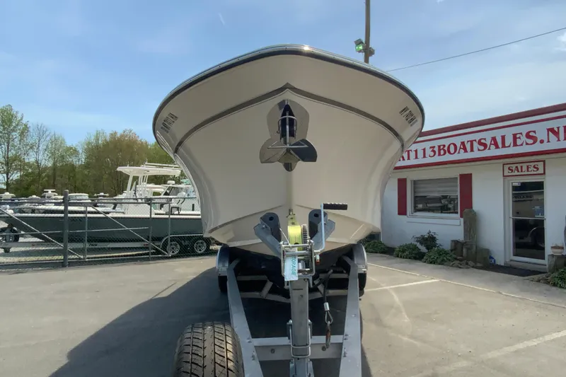 Slide: The Image of 2017 Grady-White Freedom 307 boat on trailer at dealership. - 4