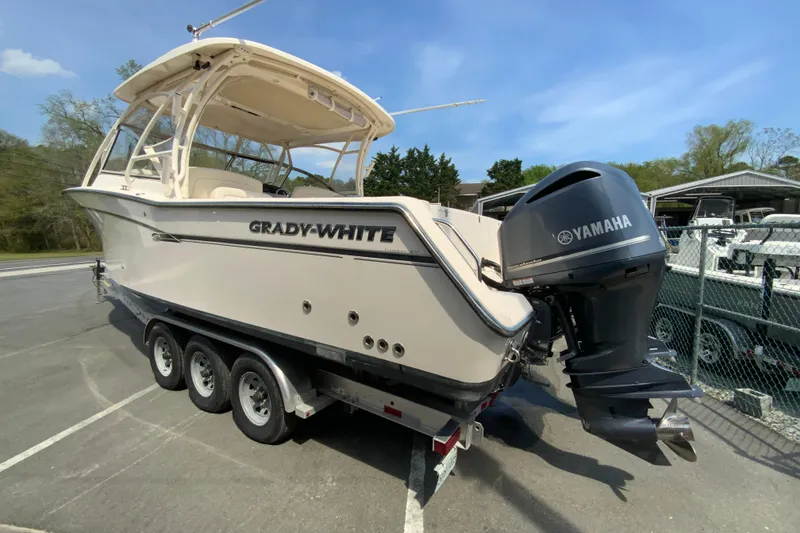 Slide: The Image of 2017 Grady-White Freedom 307 boat with Yamaha engine on a trailer. - 7