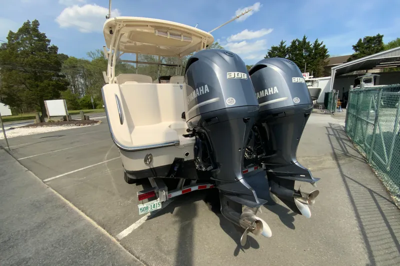 Slide: The Image of 2017 Grady-White Freedom 307 boat with twin Yamaha 300 engines on a trailer. - 8