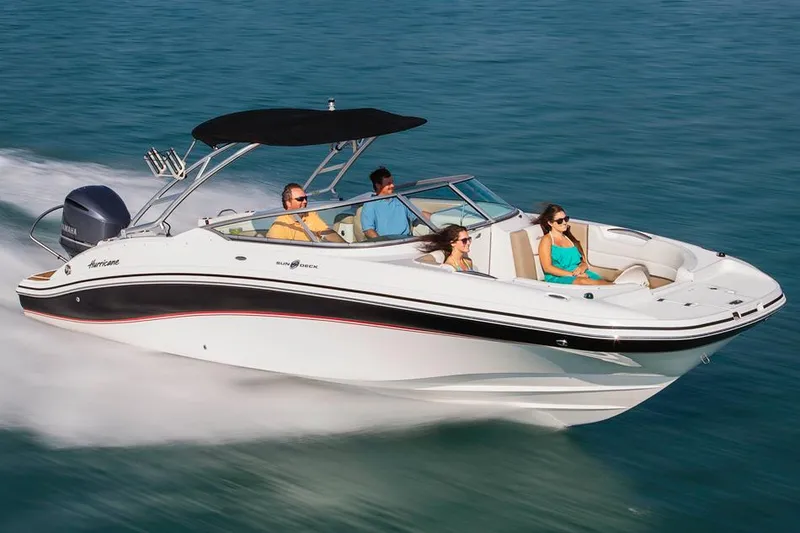 The Image of Manufacturer Provided Image: 2016 Hurricane SunDeck 2690 OB boat cruising on water with passengers. - 0