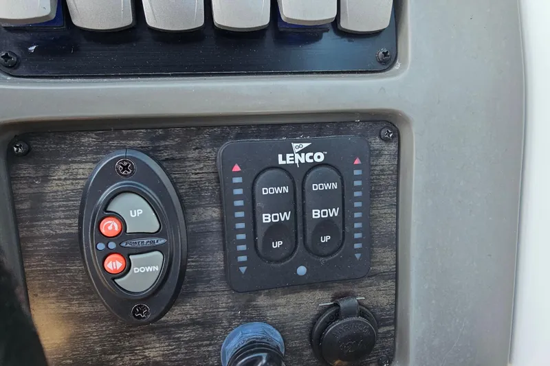 Slide: The Image of Control panel of a 2016 Hurricane SunDeck 2690 OB boat with Lenco trim tabs. - 36