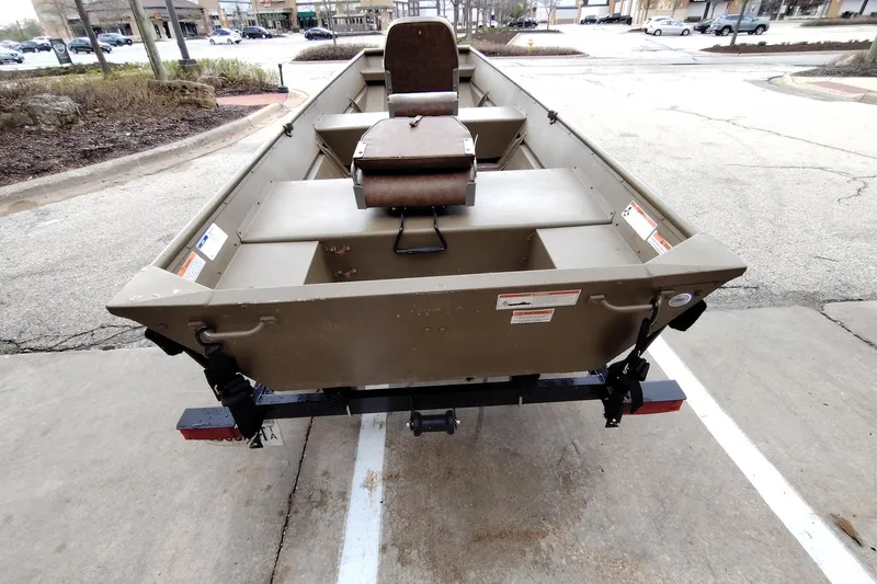 Slide: The Image of 2022 G3 1236 boat on trailer in parking lot, rear view. - 3