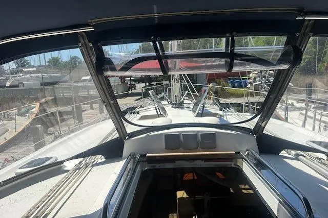 Slide: The Image of Cockpit view of 2011 Hunter Aft Cockpit 50 sailboat in a marina. - 12