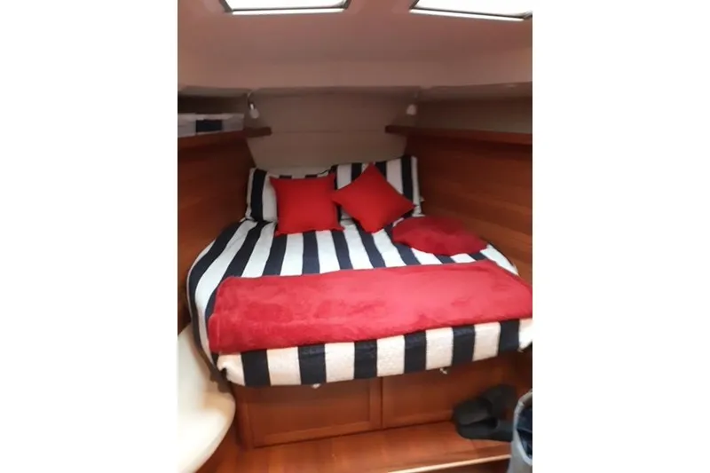 Slide: The Image of Shower area in 2011 Hunter Aft Cockpit 50 yacht with wooden bench and chrome fixtures. - 26