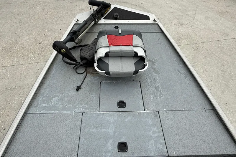 Slide: The Image of 2016 Tracker Pro 170 boat deck with seat and trolling motor. - 8