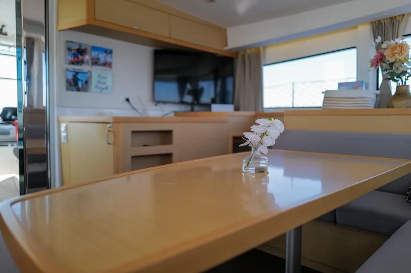 Slide: The Image of Interior of 2018 Lagoon 42 yacht with elegant table and floral decor. - 24