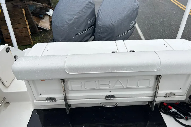 Slide: The Image of 2011 Robalo R265 Walkaround boat with Yamaha engines, rear view. - 24