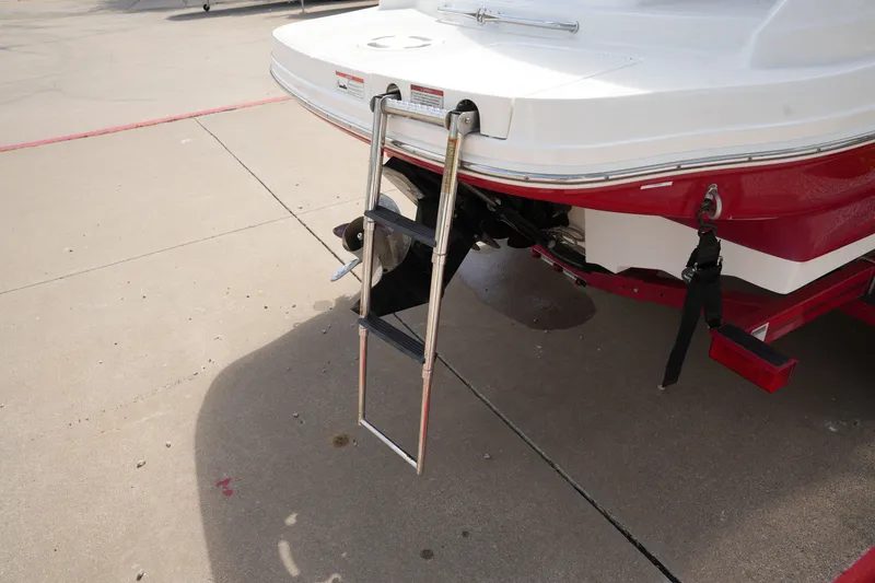 Slide: The Image of Rear view of a 2011 Sea Ray 200 Sundeck with swim ladder. - 7
