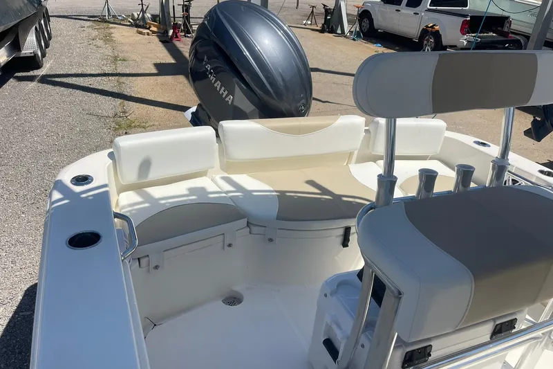 Slide: The Image of 2026 Bulls Bay 200 Center Console boat interior with seating and Yamaha engine. - 10