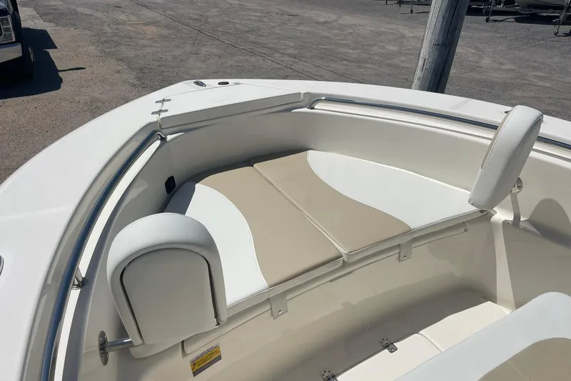 Slide: The Image of 2026 Bulls Bay 200 Center Console boat interior with cushioned seating. - 6