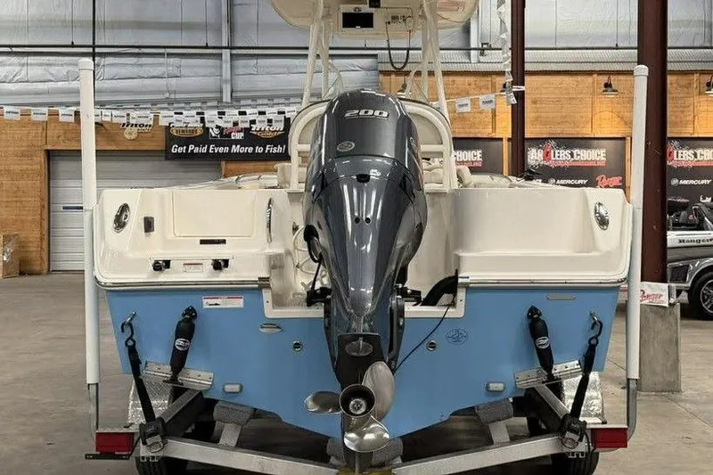 Slide: The Image of 2022 Sailfish 220 CC boat with 200 HP engine in showroom. - 5