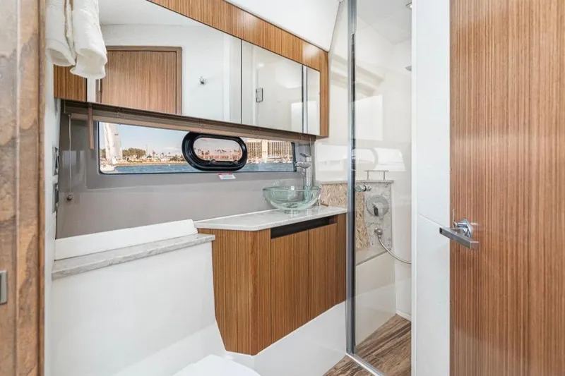 Slide: The Image of Luxurious bathroom interior of 2017 Sea Ray 460 Sundancer yacht with modern fixtures. - 22