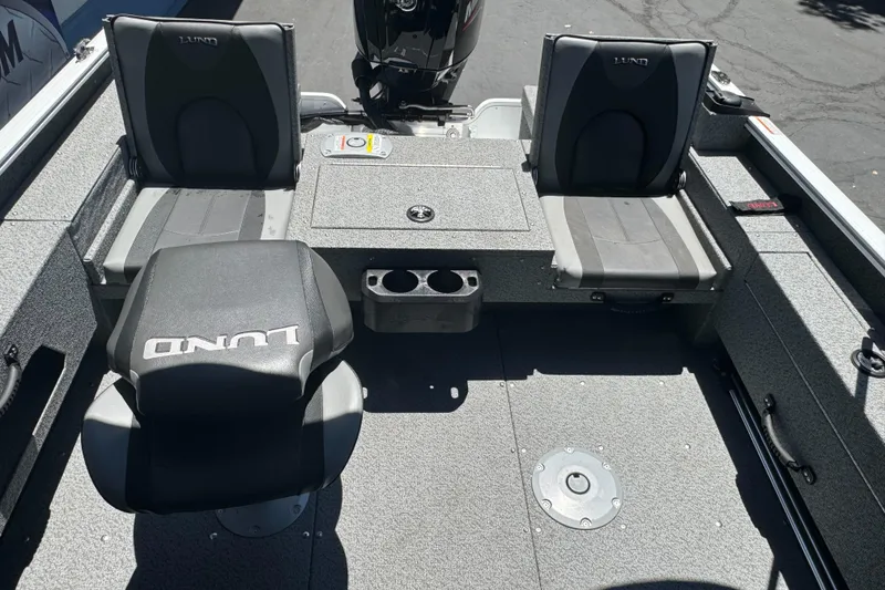 Slide: The Image of 2026 Lund 1775 Adventure Sport boat interior with seating and storage compartments. - 15