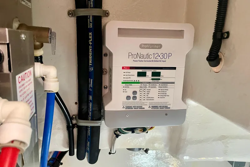 Slide: The Image of ProMariner ProNautic 12:30P charger in 2006 Cabo 40 Flybridge boat engine room. - 112