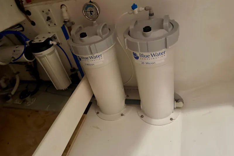 Slide: The Image of BlueWater desalination system in a 2006 Cabo 40 Flybridge yacht engine room. - 115