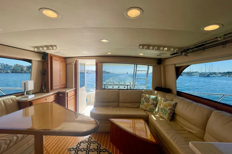 Slide: The Image of Luxurious interior of 2006 Cabo 40 Flybridge yacht with scenic ocean view. - 27