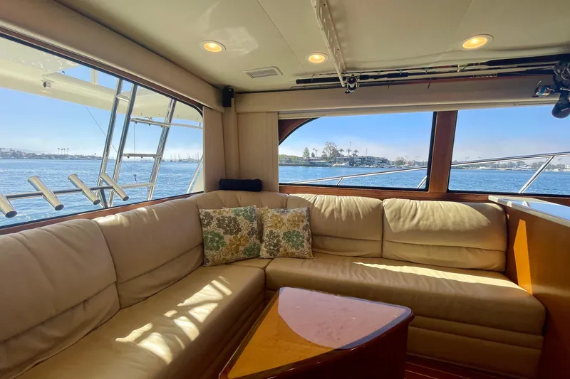 Slide: The Image of Luxurious interior of 2006 Cabo 40 Flybridge yacht with scenic water view. - 44