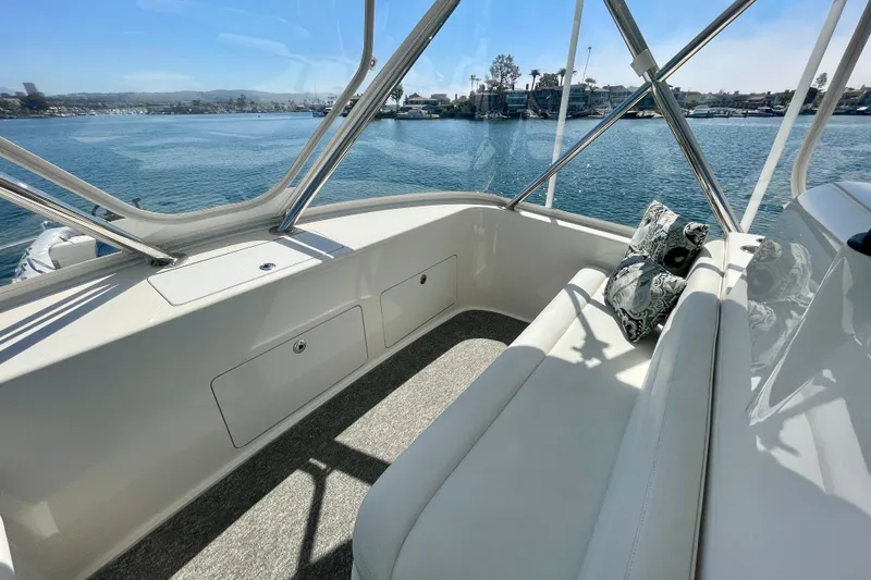 Slide: The Image of Luxurious 2006 Cabo 40 Flybridge interior with scenic waterfront view. - 61