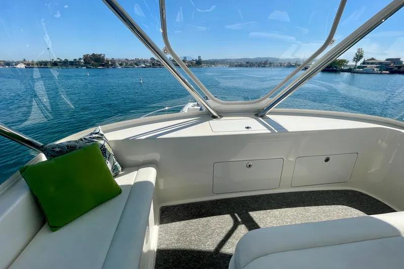 Slide: The Image of Luxurious 2006 Cabo 40 Flybridge interior with scenic ocean view. - 62