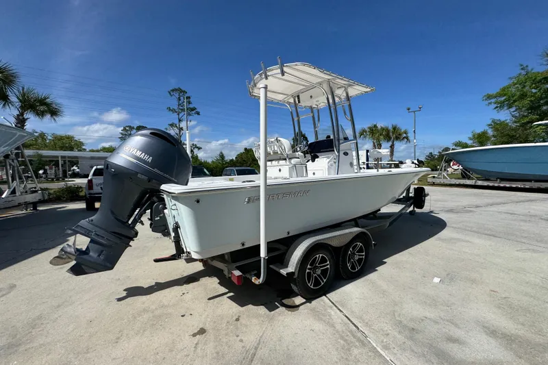 Slide: The Image of 2015 Sportsman Masters 227 Bay Boat on trailer with Yamaha outboard motor. - 12