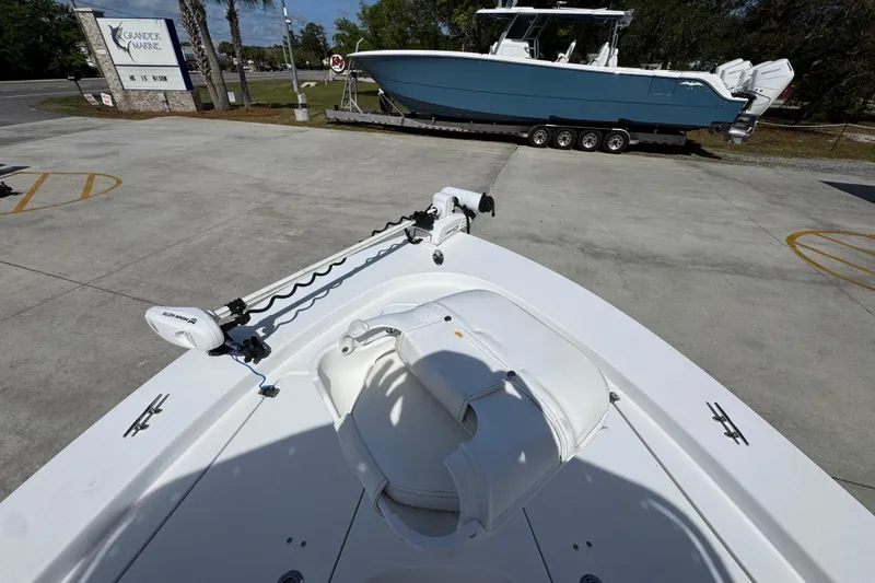 Slide: The Image of 2015 Sportsman Masters 227 Bay Boat at dealership, featuring sleek design and modern equipment. - 21