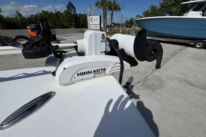 Slide: The Image of Minn Kota Terrova trolling motor on 2015 Sportsman Masters 227 Bay Boat, parked outdoors. - 22
