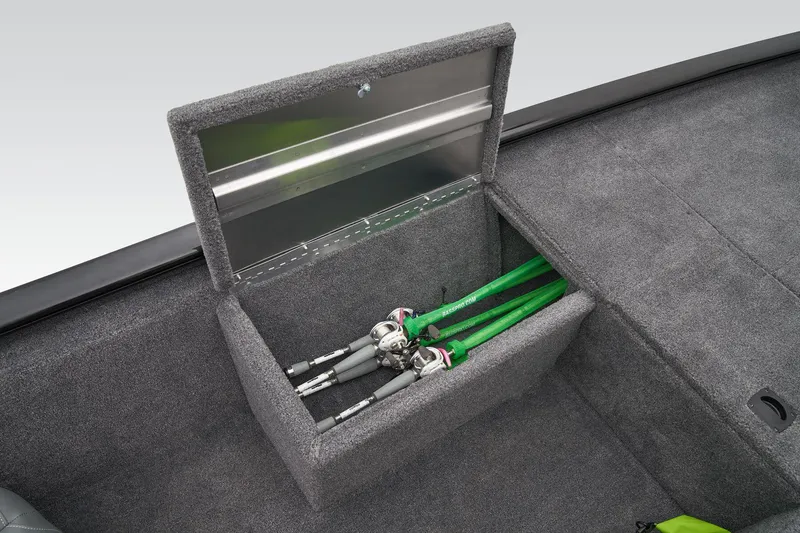 Slide: The Image of 2025 Tracker Pro 170 fishing rod compartment with green rods. - 26