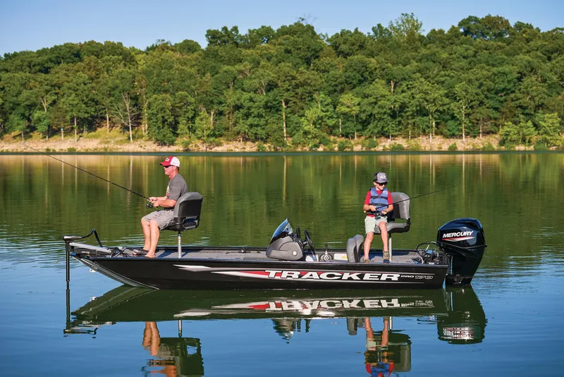 Slide: The Image of Two people fishing on a 2025 Tracker Pro 170 boat. - 37
