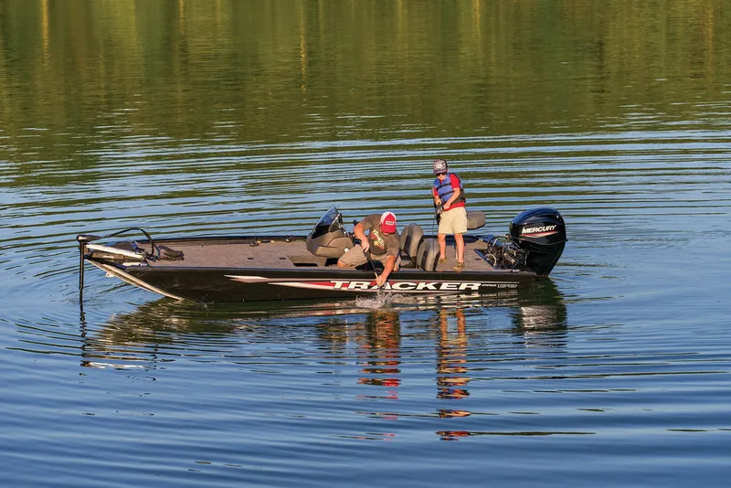 Slide: The Image of Two people fishing on a 2025 Tracker Pro 170 boat. - 40