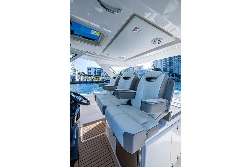 Slide: The Image of Luxurious interior of 2023 Tiara Sport 34 LS boat with plush seating and modern design. - 45