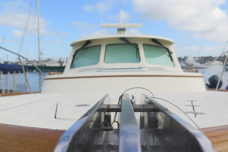 Slide: The Image of 2007 Hinckley Talaria 40 yacht, close-up of bow and deck, docked in marina. - 12