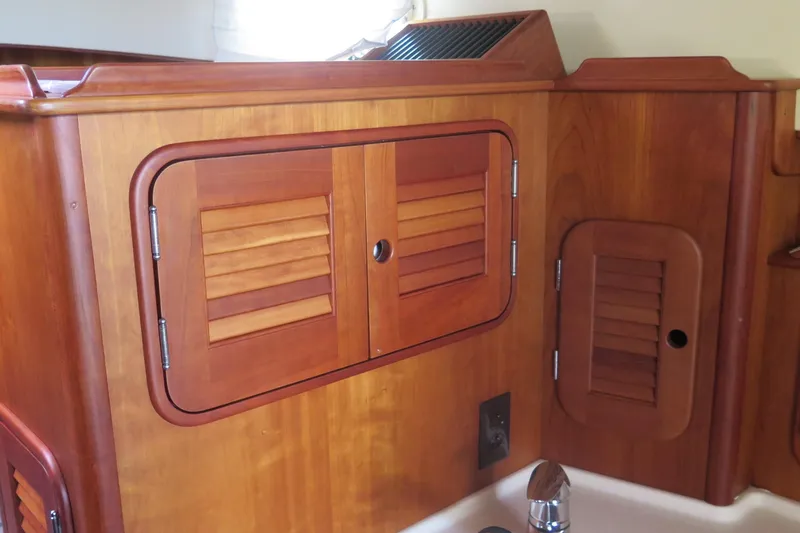 Slide: The Image of Wooden cabinetry detail on a 2007 Hinckley Talaria 40 yacht interior. - 21
