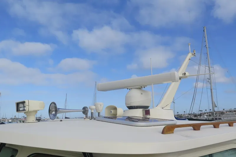 Slide: The Image of Hinckley Talaria 40 yacht, 2007 model, featuring radar and navigation equipment against a blue sky. - 36