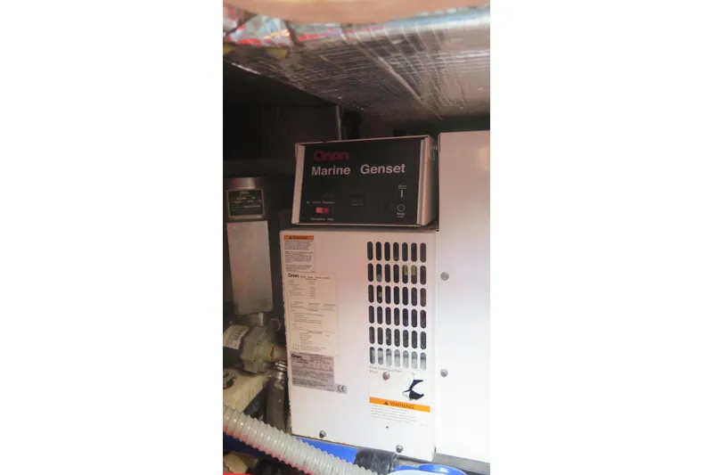 Slide: The Image of Onan Marine Genset in 2007 Hinckley Talaria 40 engine room. - 37