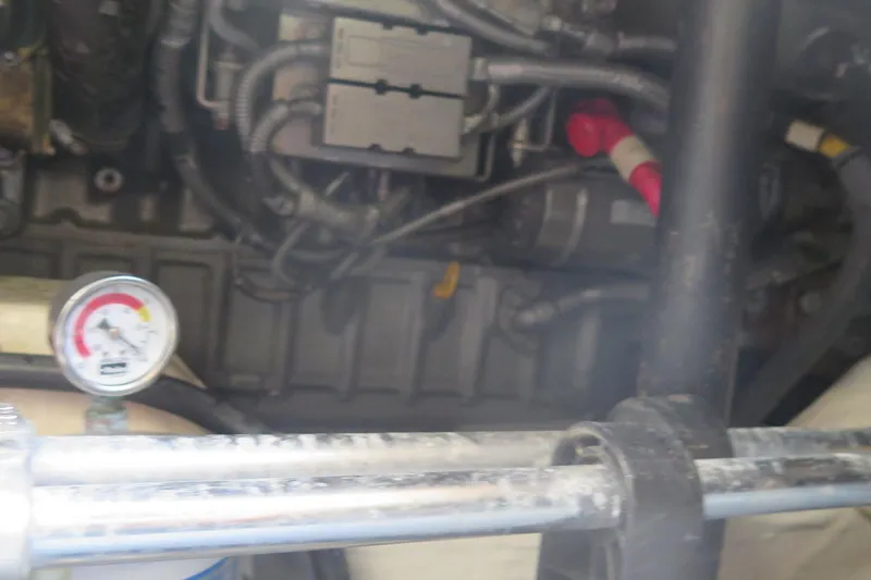 Slide: The Image of Engine compartment of a 2007 Hinckley Talaria 40 with visible gauge and wiring. - 39