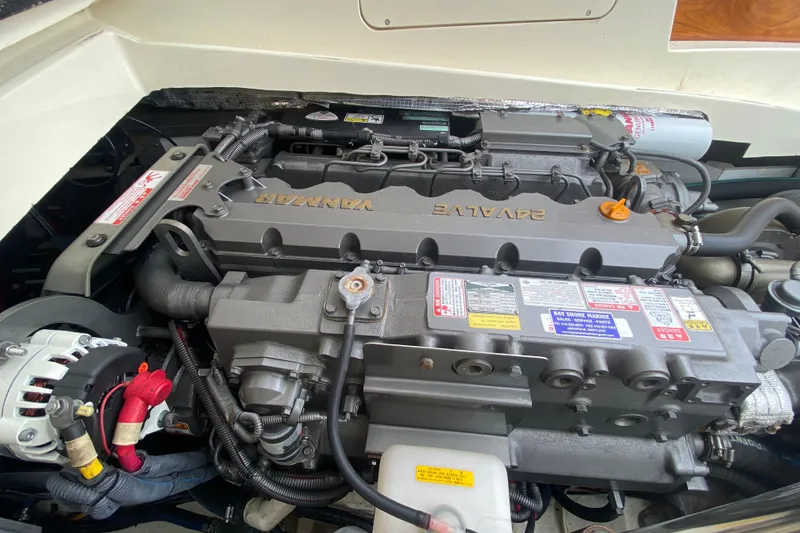 Slide: The Image of Engine compartment of a 2007 Hinckley Talaria 40 boat, featuring a Yanmar engine. - 43