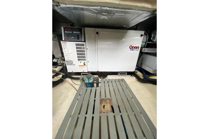 Slide: The Image of Engine room of 2007 Hinckley Talaria 40 with Onan Marine Genset. - 49