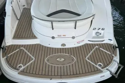 Slide: The Image of 2007 Chaparral 276 SSX boat deck with teak flooring and seating area. - 4