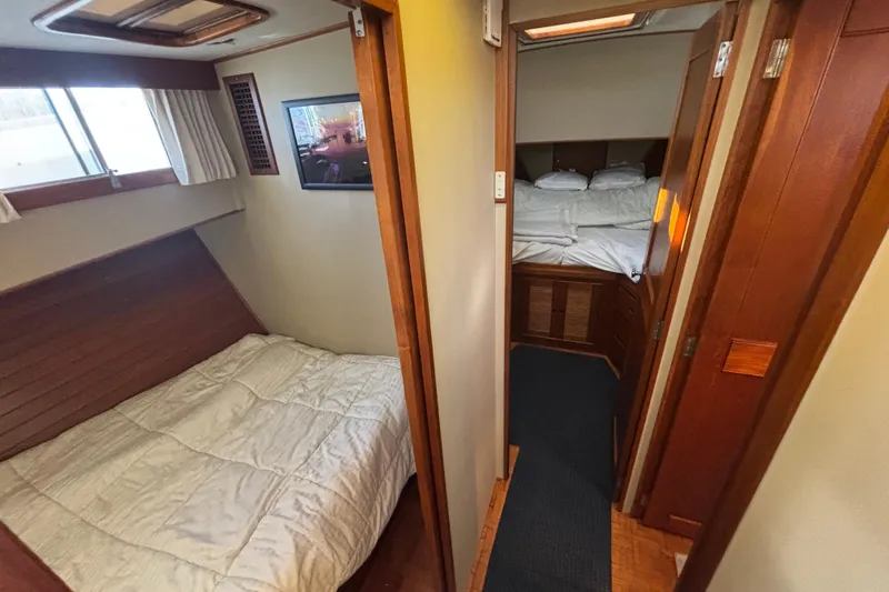 Slide: The Image of 1989 Grand Banks 46 Classic yacht interior with cozy bedrooms and wooden finishes. - 117