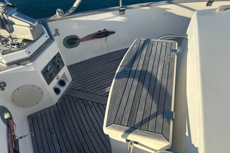 Slide: The Image of 1989 Grand Banks 46 Classic yacht deck with wooden flooring and equipment. - 33