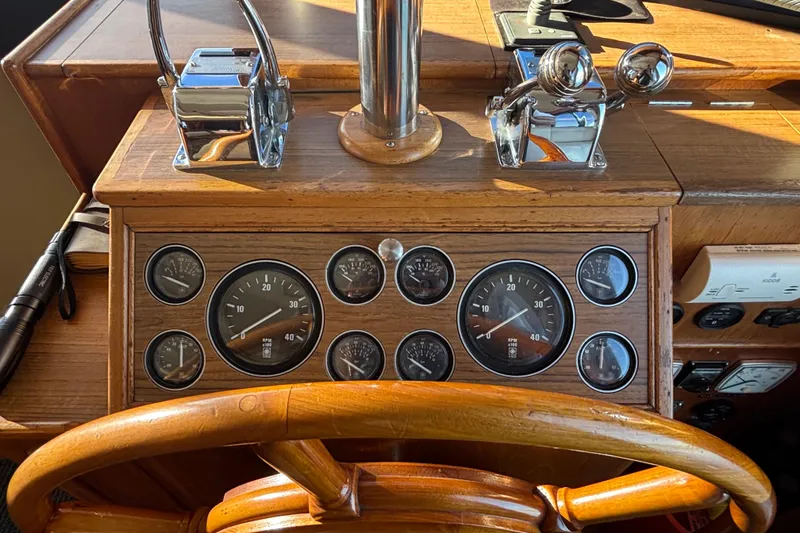 Slide: The Image of 1989 Grand Banks 46 Classic helm with wooden wheel and vintage gauges. - 77