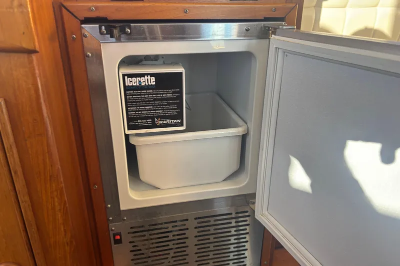 Slide: The Image of Ice maker inside 1989 Grand Banks 46 Classic yacht, featuring Raritan Icerette model. - 82