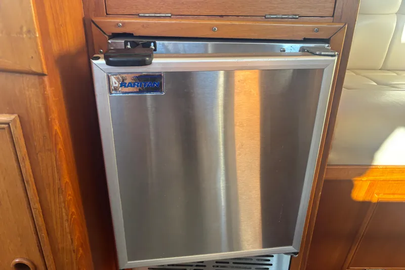 Slide: The Image of Stainless steel Raritan fridge on 1989 Grand Banks 46 Classic yacht. - 84