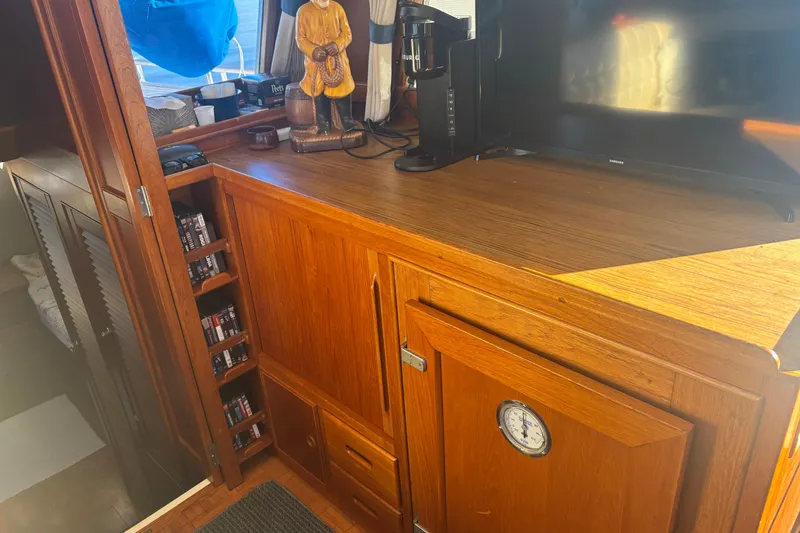 Slide: The Image of Interior of 1989 Grand Banks 46 Classic yacht with wooden cabinetry and decor. - 96