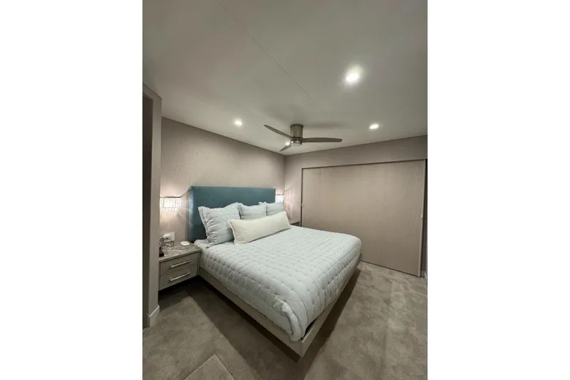 Slide: The Image of Modern bedroom in Adonia Layin' Low 2022, featuring cozy bed and ambient lighting. - 13