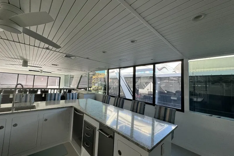 Slide: The Image of Modern interior of 2022 Adonia Layin' Low yacht with sleek kitchen design. - 27