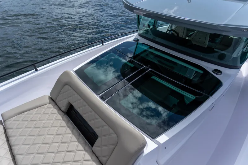 Slide: The Image of 2022 Axopar 37 XC Cross Cabin boat with sleek design and luxurious seating. - 20