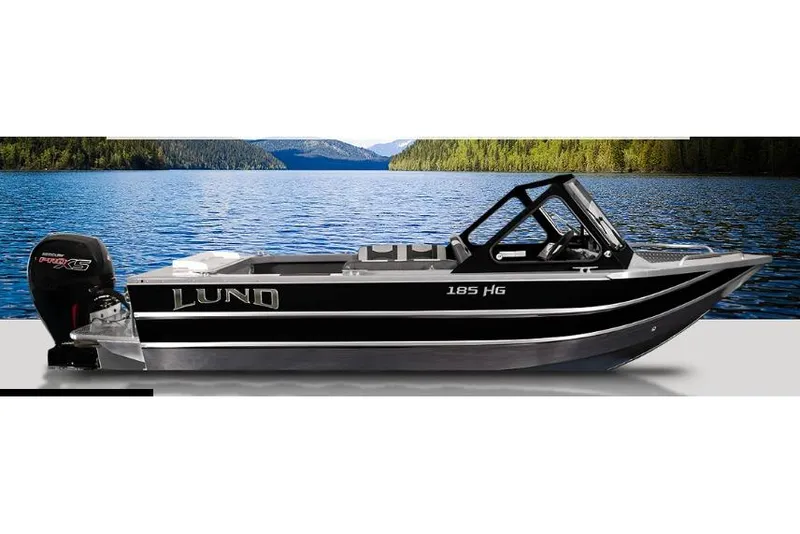 The Image of 2026 Lund 185 Heavy Gauge boat on scenic lake background. - 1